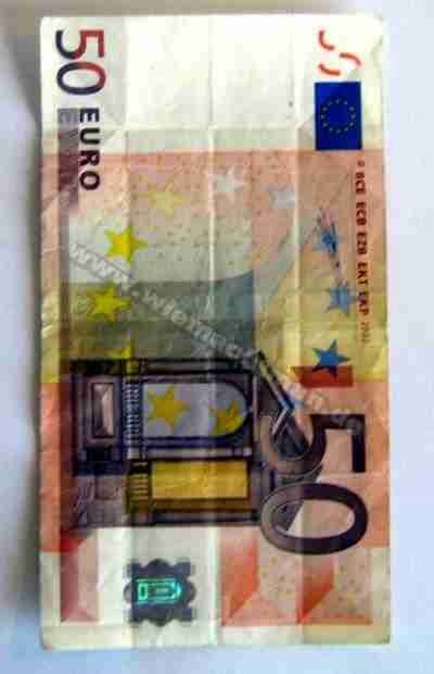 Shirt wrinkles out of money
