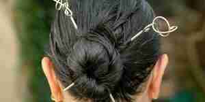 Style hair with a chignon