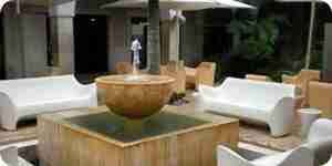 Decorating a patio room: wood, wicker and wrought iron furniture