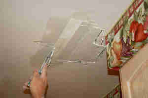 how to fix holes in walls