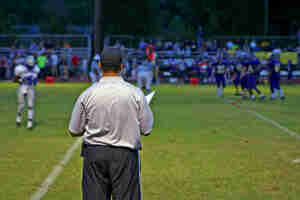 You are a College Football coach